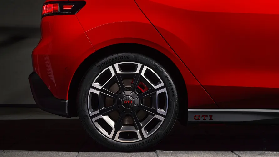 VW ID.Polo GTI interior showing physical buttons and sport steering wheel